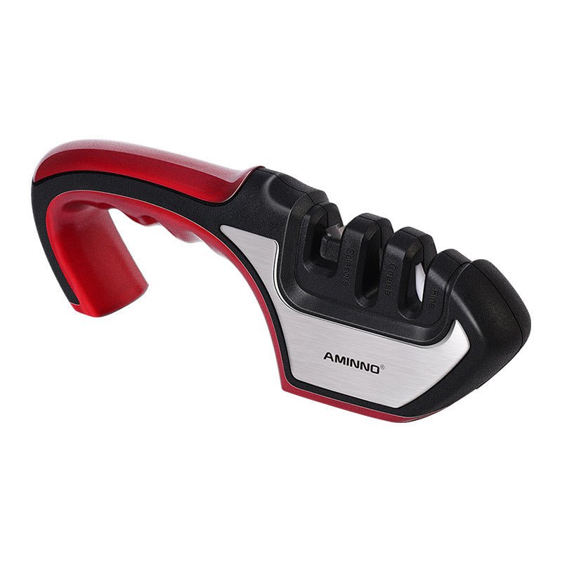 A Four - in - one Family Uses A Sharpener To Sharpen A Kitchen Knife - Asmota