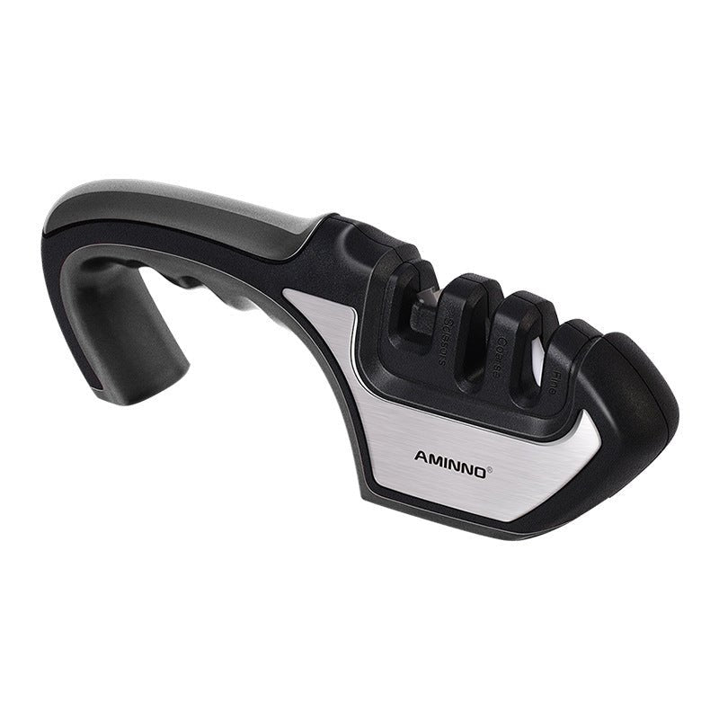 A Four - in - one Family Uses A Sharpener To Sharpen A Kitchen Knife - Asmota