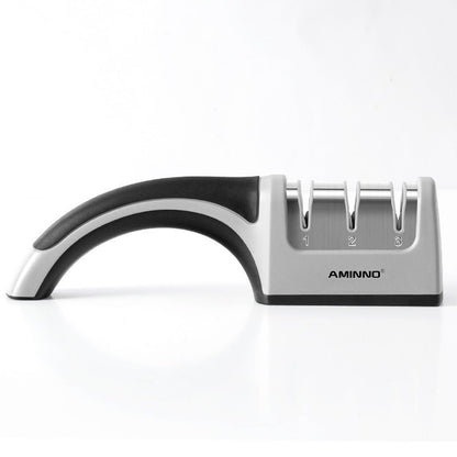 A Four - in - one Family Uses A Sharpener To Sharpen A Kitchen Knife - Asmota