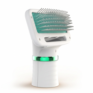 Asmota electric dog hair dryer comb with white plastic body, teal accent, and angled grooming bristles.
