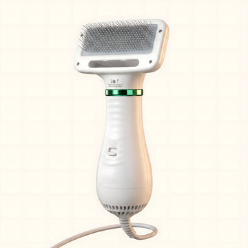 Asmota electric dog hair dryer comb with white plastic body, two-speed airflow, and gentle angled grooming bristles.